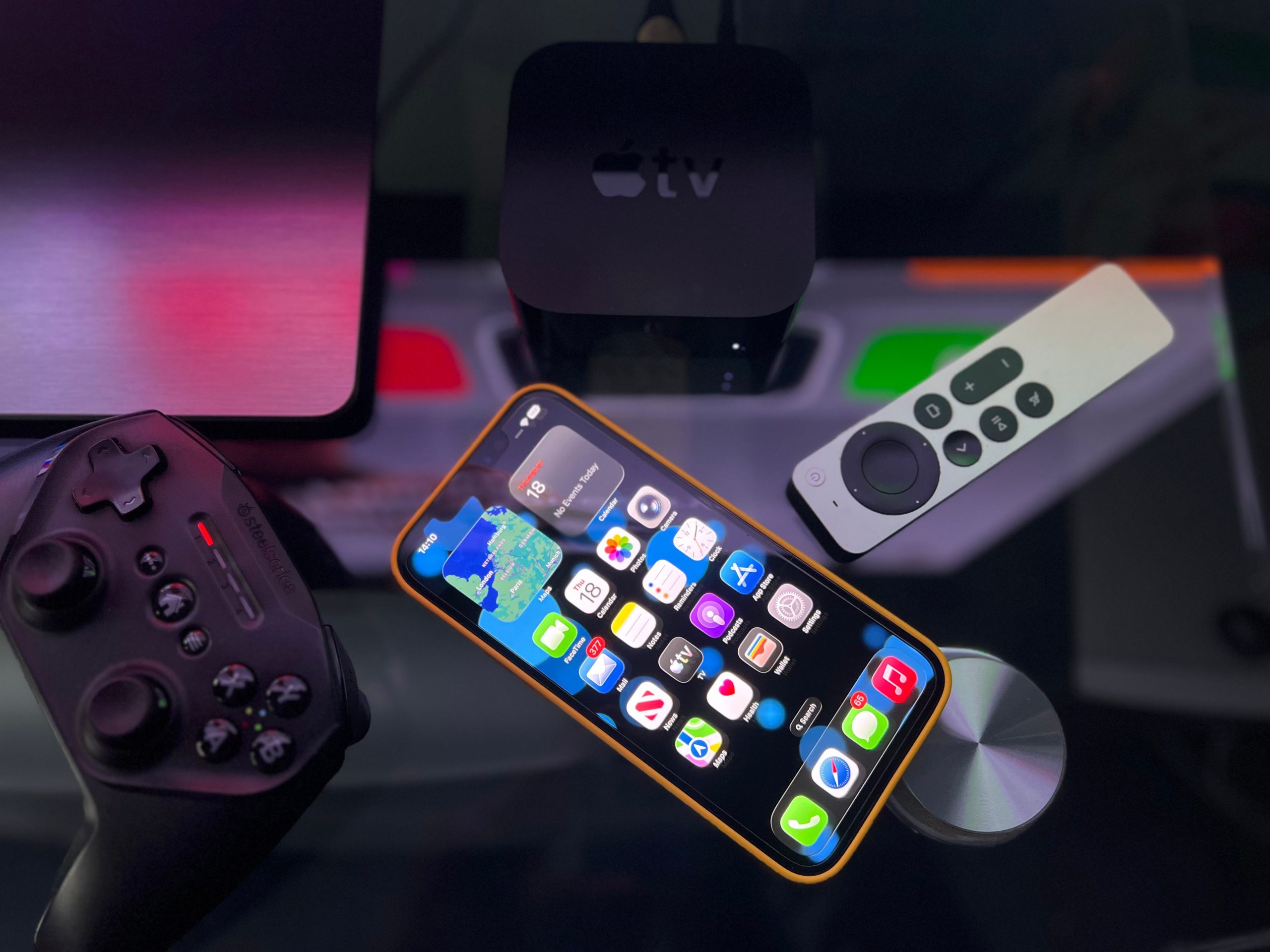 Système divertissement avec iPhone, Apple TV et manette